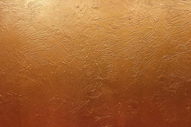 istock Gold background or texture and gradients shadow. Gold background paper, texture is old vintage distressed solid glitter gold color with rough peeling grunge paint on edges. 960716580