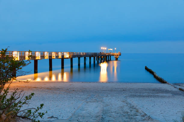 Illuminated pier at the Baltic Sea