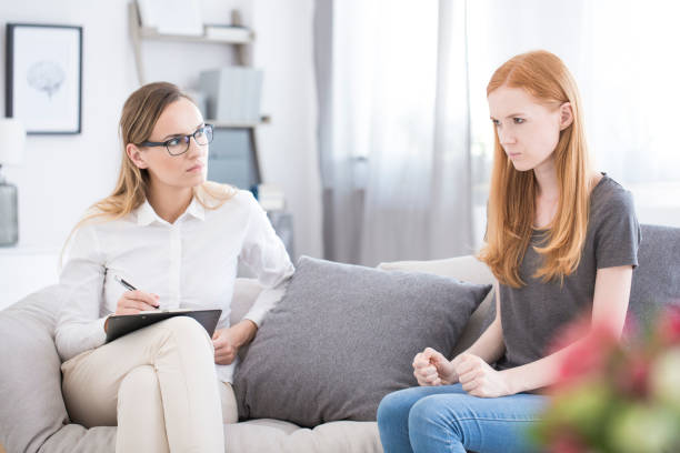 istock Angry girl sitting in psychotherapy 960734698