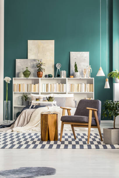 istock Grey and green bedroom interior 960739700
