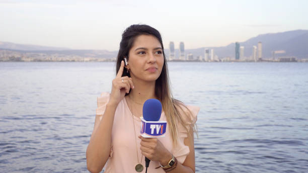 istock Female TV reporter 960742794