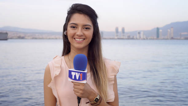 istock Female TV reporter 960742796