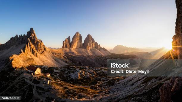 Three Peaks Of Lavaredo At Sunset Dreizinnenhütte Refuge Antonio Locatelli Stock Photo - Download Image Now