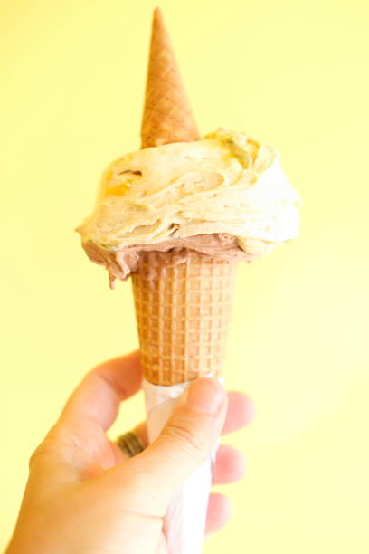 istock One Ice cream on Yellow Background 960750038