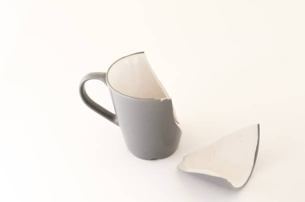 istock A broken tea mug. Gray mug made of ceramics. 960752794