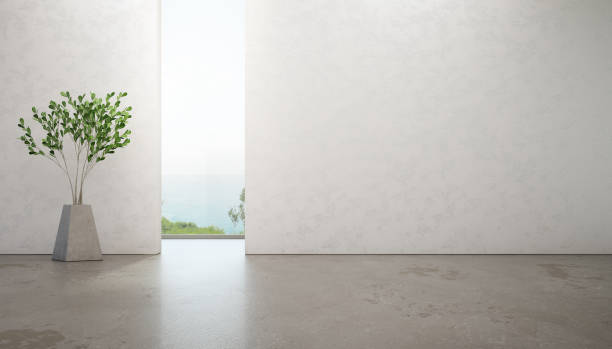 ガラス ウィンドウと灰色のコンクリート床の高級夏ビーチ ハウスの海ビュー ルーム。自宅や休日の別荘の空の白い壁の背景。 - wall office indoors white ストックフォトと画像