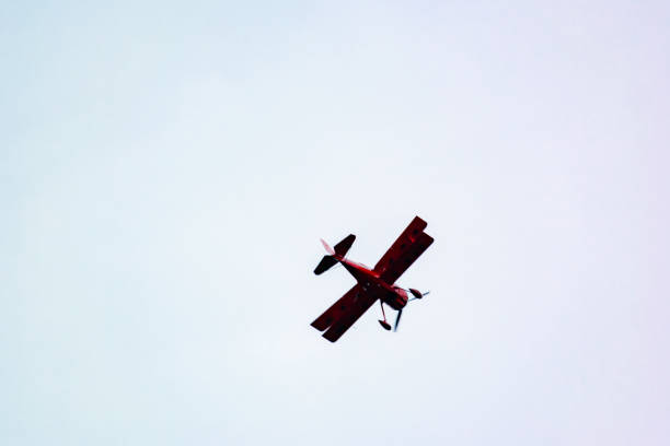 istock Low Angle View Of Airplane Flying Against Clear Sky 960754238