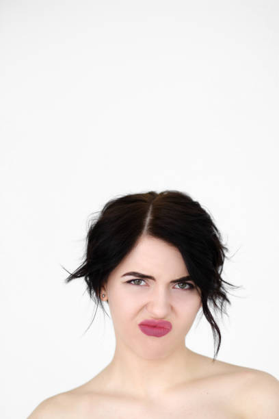 istock emotion face aversion reluctant displeased woman 960758856