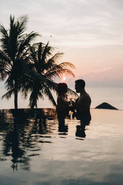 istock Couple enjoying a romantic sunset 960758898