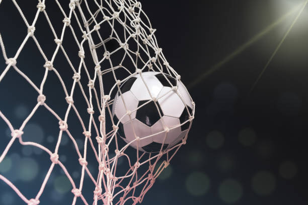 istock Soccer ball scores a goal on the net 960760040