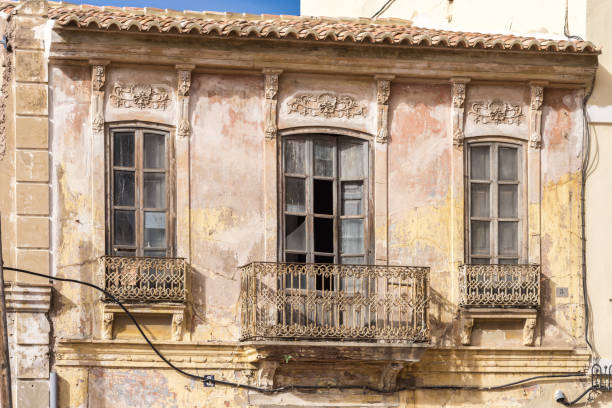 istock Old uninhabited Architecture of Classical Building Facade on Old Historical House 960766224