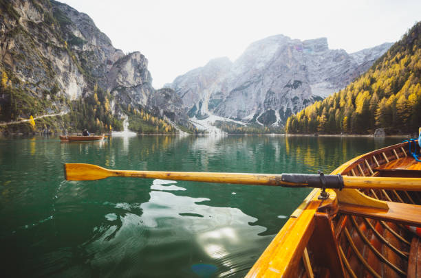 istock Traditional rowing boat on a lake in the Alps in fall 960766716