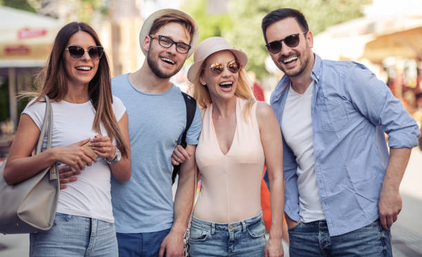 istock Friends having fun together outdoors 960776480