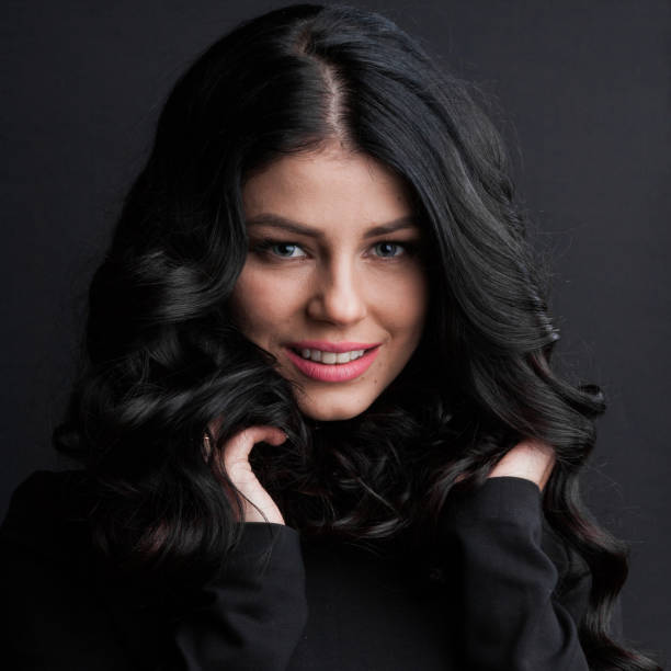 istock Gorgeous brunette with curly hair 960785292