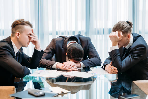 istock business failure bankruptcy stressed defeated team 960791350