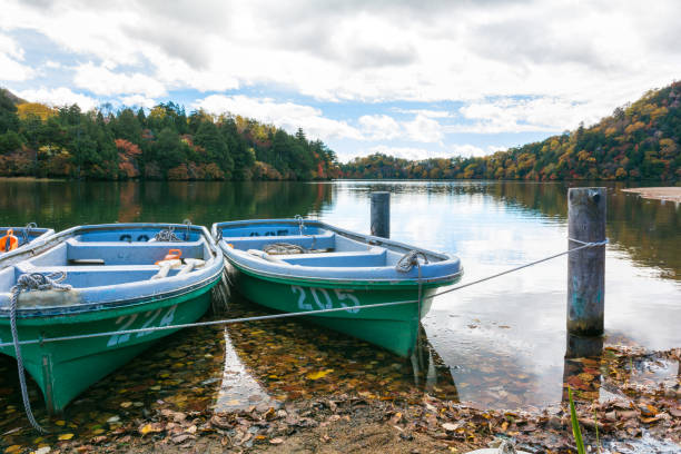 istock Boats on a blue lake and blue sky nature 960794560