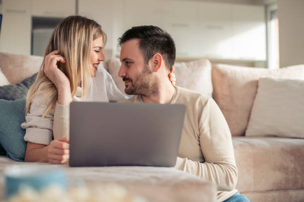 istock Happy couple enjoying at home 960800426