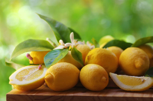 istock ripe lemons on wooden table 960801052