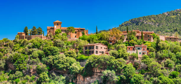 istock Beautiful mediterranean village Deia on Majorca, Spain Mediterranean Sea, panoramic view 960821740