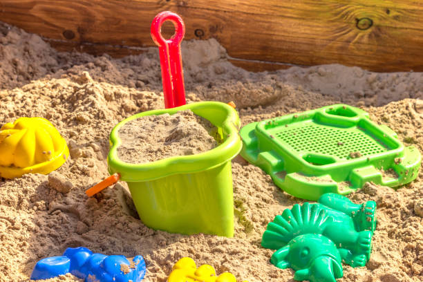 sandbox with toys on children playground sandbox with toys on children playground sandbox stock pictures, royalty-free photos & images