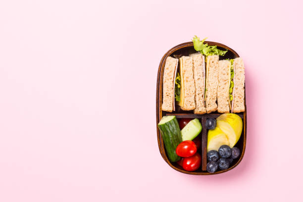 istock School wooden lunch box with sandwiches 960828958