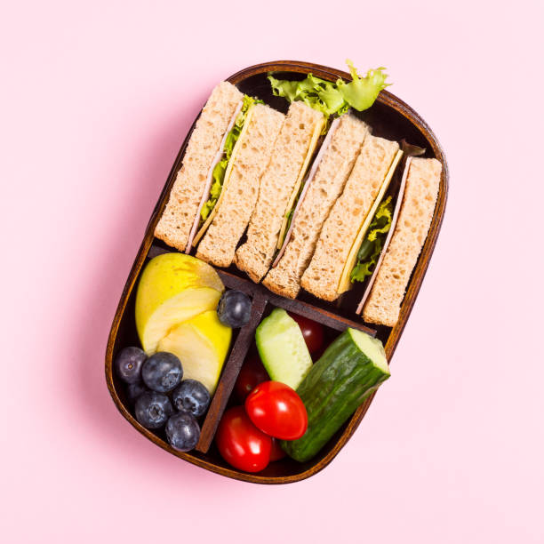 istock School wooden lunch box with sandwiches 960829004