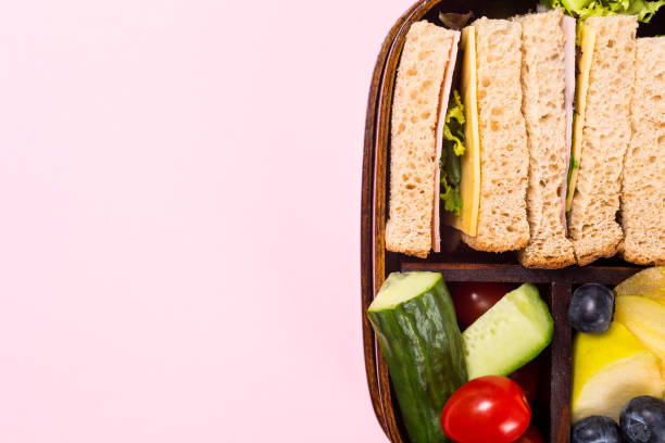 istock School wooden lunch box with sandwiches 960829044