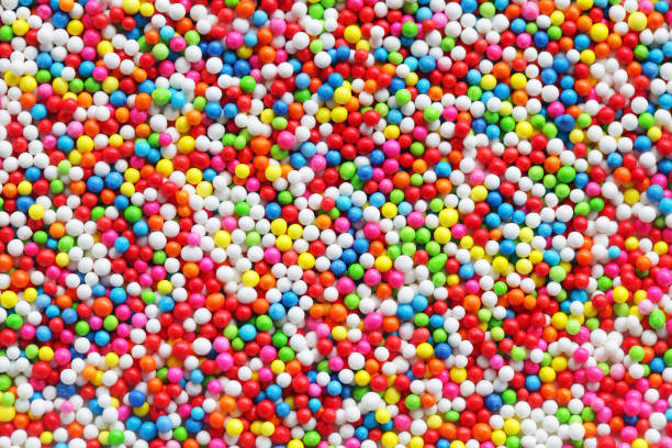 istock close up of colorful sprinkle sugar background. 960829610