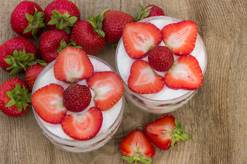 Dessert with cream and fresh strawberries (view from the top)