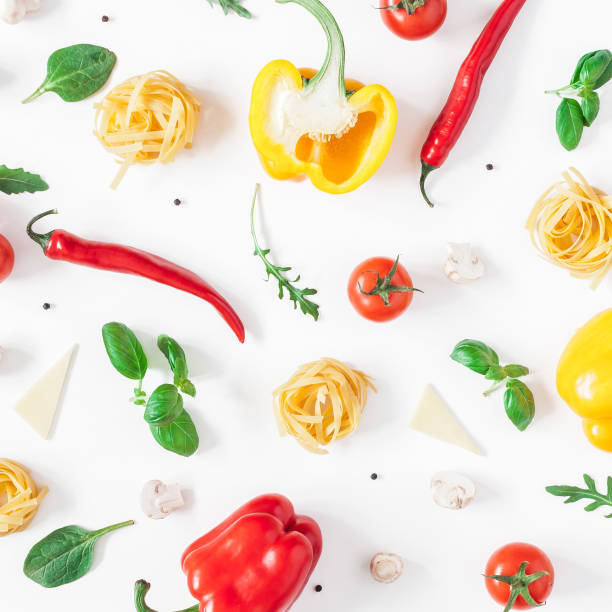 istock Ingredients for cooking pasta on white background. Flat lay 960844144
