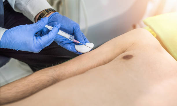 istock Unrecognizable mid adult man taking a vaccine. 960844202