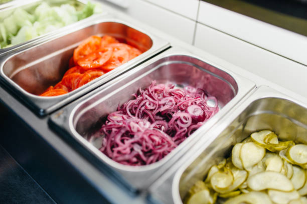 istock Pallets with fresh vegetables for burger cooking 960858094