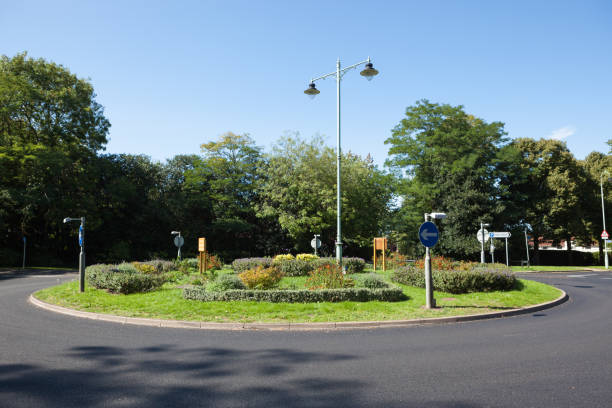 The first roundabout built in Britain The first roundabout built in Britain, circa 1909, in Letchworth Garden City. traffic circle photos stock pictures, royalty-free photos & images