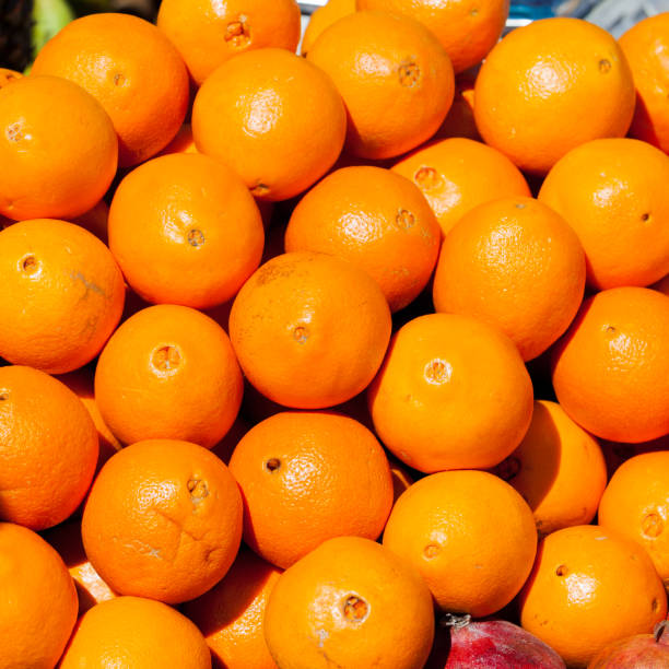 istock oranges at the market. Orange fruit. 960860696