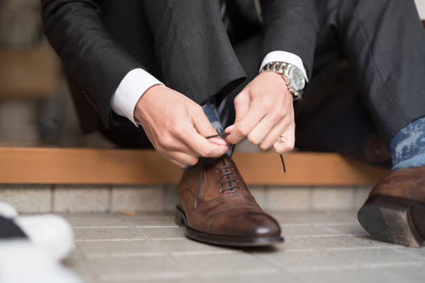 istock businessman wearing shoes 960862050