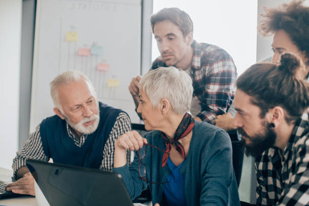 istock Senior management talking with employees 960866570