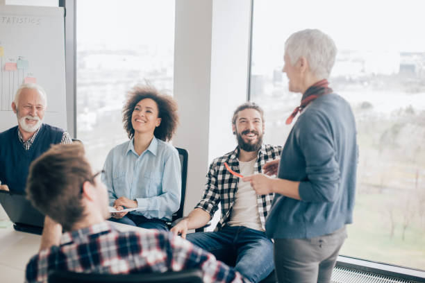 istock Coworkers smiling at office 960866690