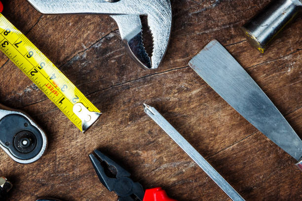 istock Different construction tools with Hand tools for home renovation on wooden board maintenance and reparing concept. 960868062