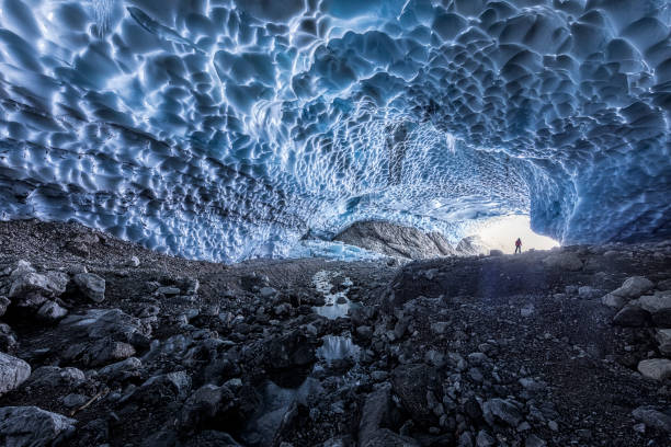 istock Hiker exploring ice cave, Eiskapelle in Nationalpark Berchtesgaden 960871238