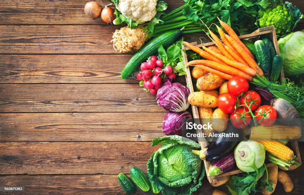 Assortment of the fresh vegetables Assortment of the fresh vegetables on rustic wooden table Vegetable Stock Photo