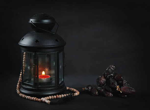 istock Ramadan Candle Lantern with Wooden Prayer Beads and Dates 960879914