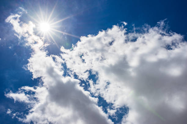 istock Idyllic view of sunny and cloudy blue sky 960880230
