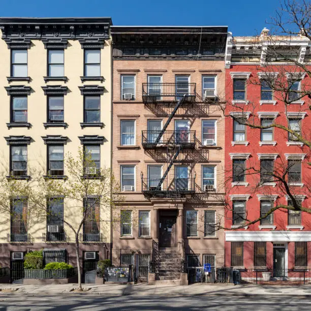 Colorful old buildings along Tompkins Square Park in the East Village of Manhattan in New York City NYC