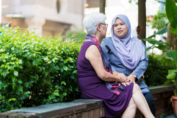 istock Daughter comforting her mother 960889994