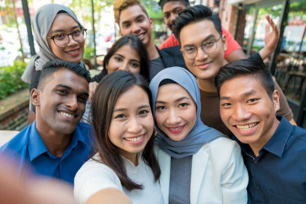istock Group of friends taking a selfie 960890010