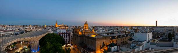 Sunset in Seville Sunset scene in Seville, Spain santa cruz seville stock pictures, royalty-free photos & images