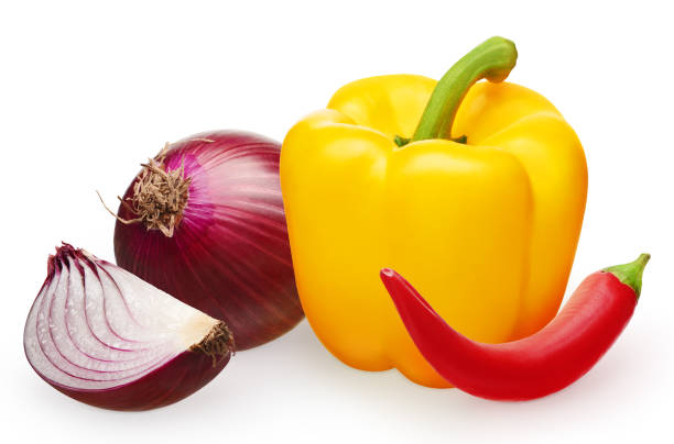 Whole fresh unpeeled red onion with slice, yellow bell pepper and red hot chili pepper isolated on white background