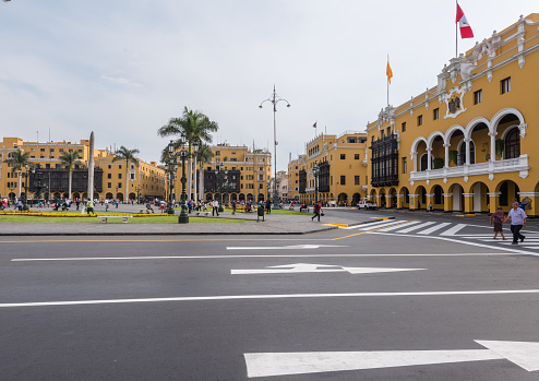 Lima, Peru--April 12, 2018. A wide angle shot across the bustling Plaza Mayor in the center of Lima, Peru.
