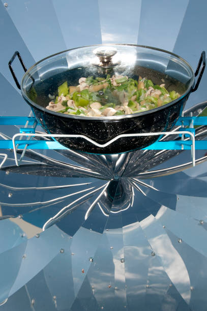 Cooking in Solar Cooker, Vegetables stock photo
