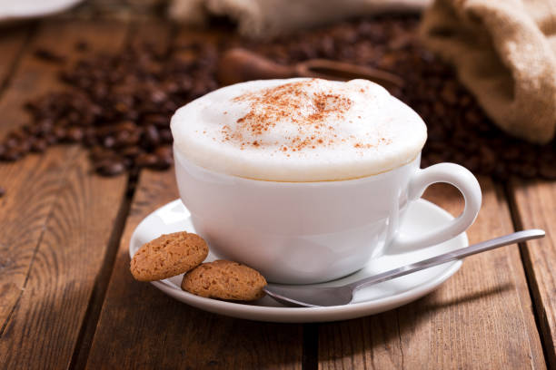 cup of cappuccino coffee - biscotti coffee cappuccino latté imagens e fotografias de stock